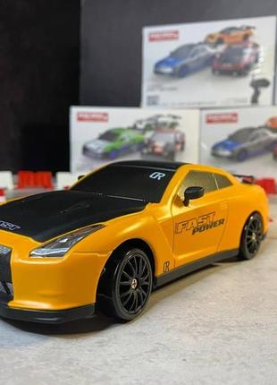 Дрифт машинка на радиоуправлении nissan gt-r r35 оранжева. машинка на пульте радиоуправления, на аккумуляторе