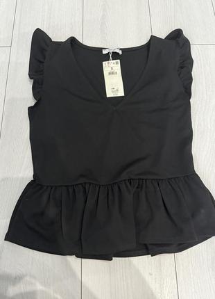 Блузка черного цвета1 фото