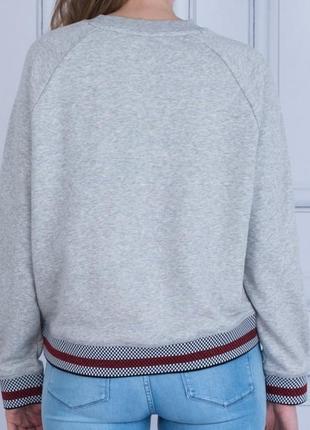 Tommy hilfiger
свитшот bria crew neck с полосатым подолом с3 фото