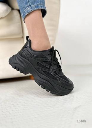 Черные кожаные резиновые кроссовки на толстой грубой подошве с резиновыми вставками
