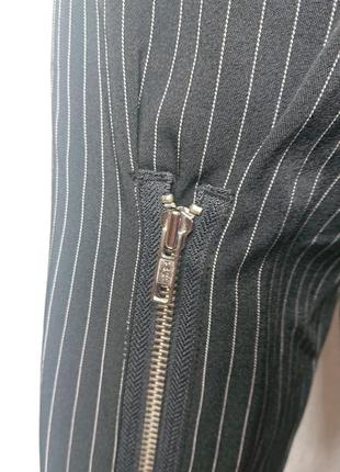 Винтажные качественные брюки в полоску со змейками10 фото