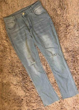 Стильные, рваные джинсы1 фото