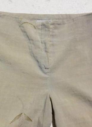 Салатовые штаны с прозрачными цветами.2 фото