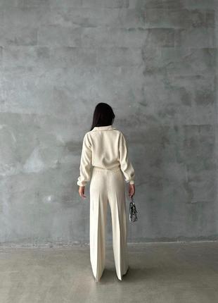 Трендовый женский костюм с широкими брюками и свитером свободного кроя5 фото