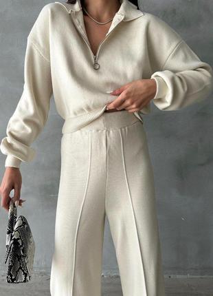 Трендовый женский костюм с широкими брюками и свитером свободного кроя2 фото