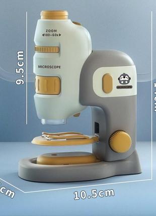Мікроскоп дитячий портативний з тримачем для телефона та збільшенням 60х — 180х7 фото