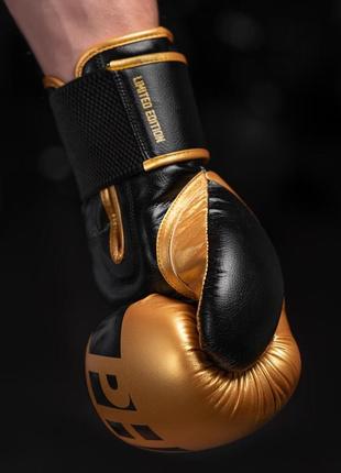 Боксерські рукавиці спортивні тренувальні для бокса phantom  elastic gold 16 унцій (капа в подарунок) dm-116 фото