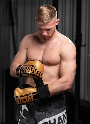 Боксерські рукавиці спортивні тренувальні для бокса phantom  elastic gold 16 унцій (капа в подарунок) dm-118 фото