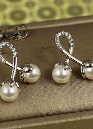 Сережки гвоздики xuping jewelry бавовна з перлинками 20 мм сріблясті