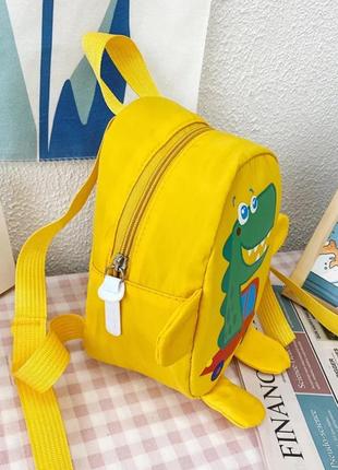 Детский мультяшный мини-рюкзак с динозавром желтый, рюкзак для детей с ремнем безопасности, защита от потери3 фото