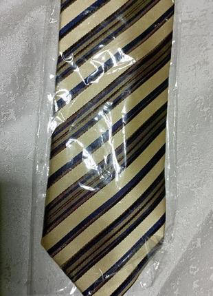 Золотистый нежный галстук ( галстук)2 фото