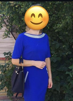 Яскрава синя сукня з блискітками та карманами1 фото