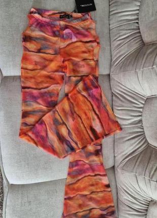 Жіночі широкі помаранчеві  пляжні штани з принтом "захід сонця" prettylittlething xs
