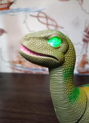 Игрушка динозавр ходит, звуковые и световые эффекты 666-3a, животные динозавр2 фото