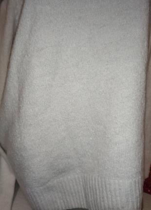 Молочный свитерок с большим горлышком от бренда studio4 фото
