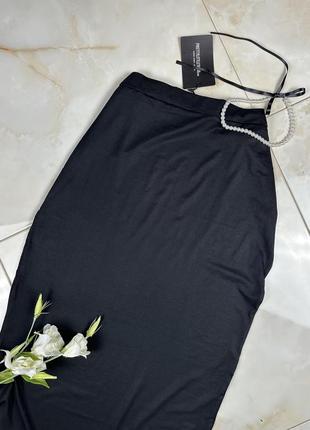 Черная трикотажная юбка-миди, размер 20xl6 фото