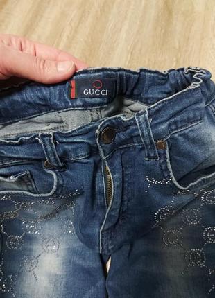 Бомбезные джинсики gucci!!
11-12 лет..2 фото