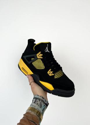 Кроссовки air jordan 4 thunder 2023 черные с желтым жемчужные / мужские1 фото