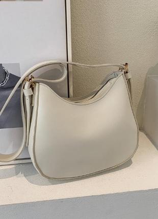 Женская стильная сумочка слинг, модная маленькая сумка для девушки на плечо1 фото