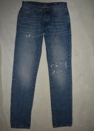 Джинсы зауженные