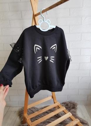 Черная кофта с кицей🐱, на рукавах рюшики (флис)👭
фирмы primark 
7/8 рочков (128см)
состояние: отличное