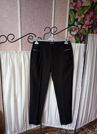 Красивые черные брюки с замочками select.1 фото