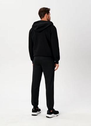 Нові спортивні трикотажні штани чорні з манжетом4 фото
