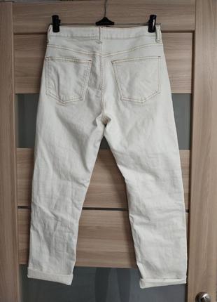 Стильні високі джинси мом молочного кольору9 фото