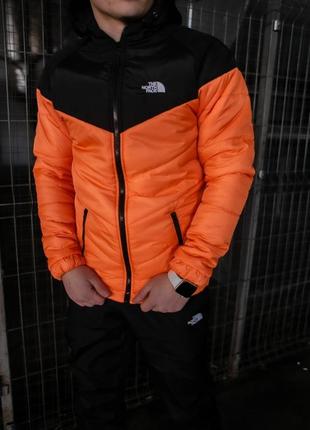 Куртка tnf черно- оранжевая1 фото