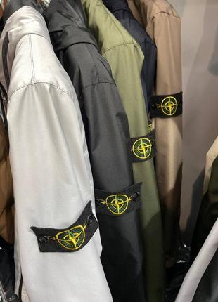 Stone island ветровка - стильная, функциональная и популярная среди любителей моды.