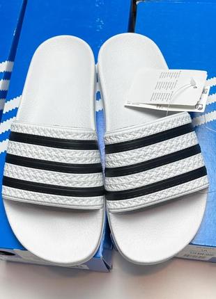 Тапки adidas adilette оригінал нові білі шльопанці сланці2 фото