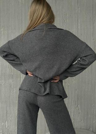 Трендовый вязаный женский костюм кофта на молнии и широкие брюки теплый комплект5 фото