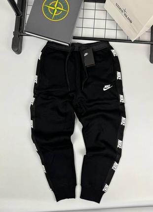 Штани nike з лампасами