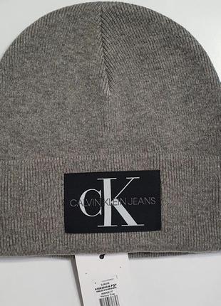 Шапка calvin klein хлопковая. оригинал. предусмотрительности