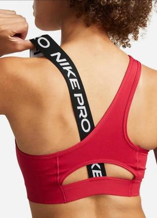 Спортивный топ nike pro dri-fit swoosh asymmeric bra (dm0570-614) оригинал4 фото