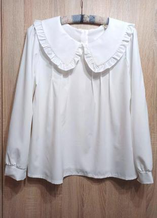 Ошатна біла блуза з комірцем