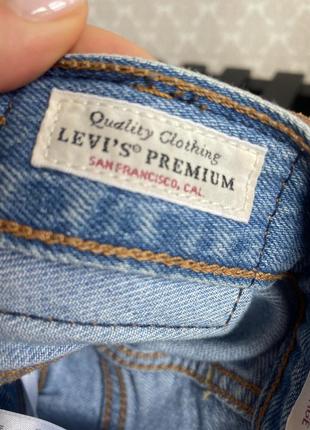 Голубые джинсы levi's 256 фото