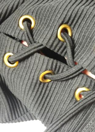Спідниця чорна в обтяжку зі шнурівкою з биркою2 фото