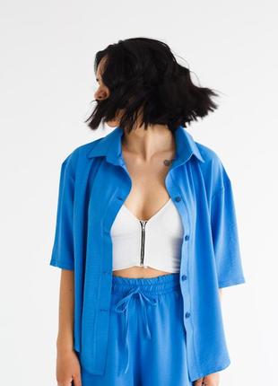 Жіночий літній костюм двійка шорти та сорочка тканина жатка синього кольору4 фото