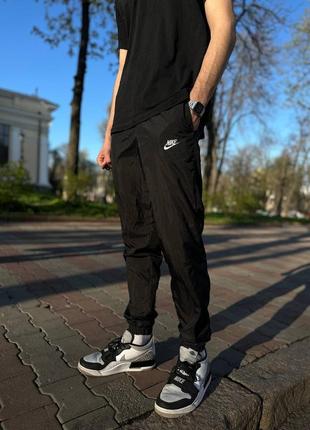 Теплые мужские нейлоновые штаны nike sportswear pant cf wo черного цвета1 фото