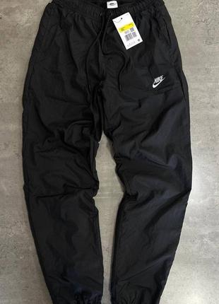 Теплые мужские нейлоновые штаны nike sportswear pant cf wo черного цвета2 фото