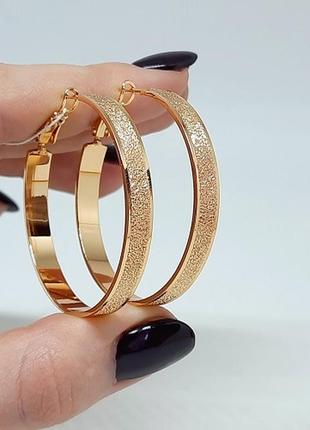 Серьги-кольца позолоченные, алмазное напыление, позолота1 фото