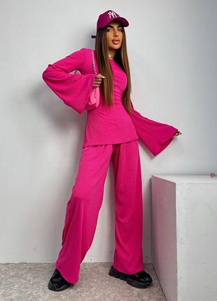 Трендовий костюм з широкими штанами і рукава клеш imm-152