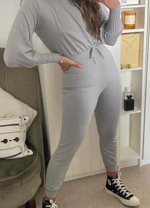 Сірий комбінезон