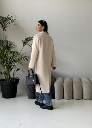 Жіноче утеплене демісезонне довге кашемірове пальто молочного кольору5 фото