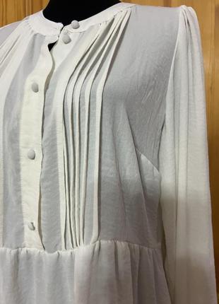 Белая блузка с баской