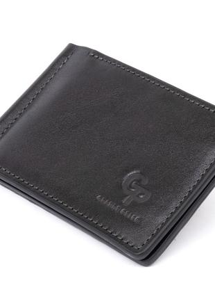 Стильное портмоне с зажимом для денег без застежки в гладкой коже grande pelle 11297 черное1 фото