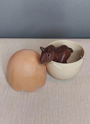 Игрушка динозавр в яйце макдональдс4 фото