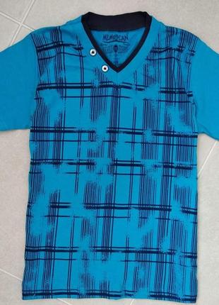 Класна нова футболка на 7 - 8 років.