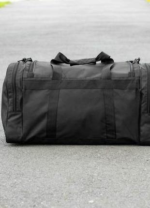 Мужская дорожная сумка everlast green logo спортивная черная текстильная на 60л для путешествий9 фото